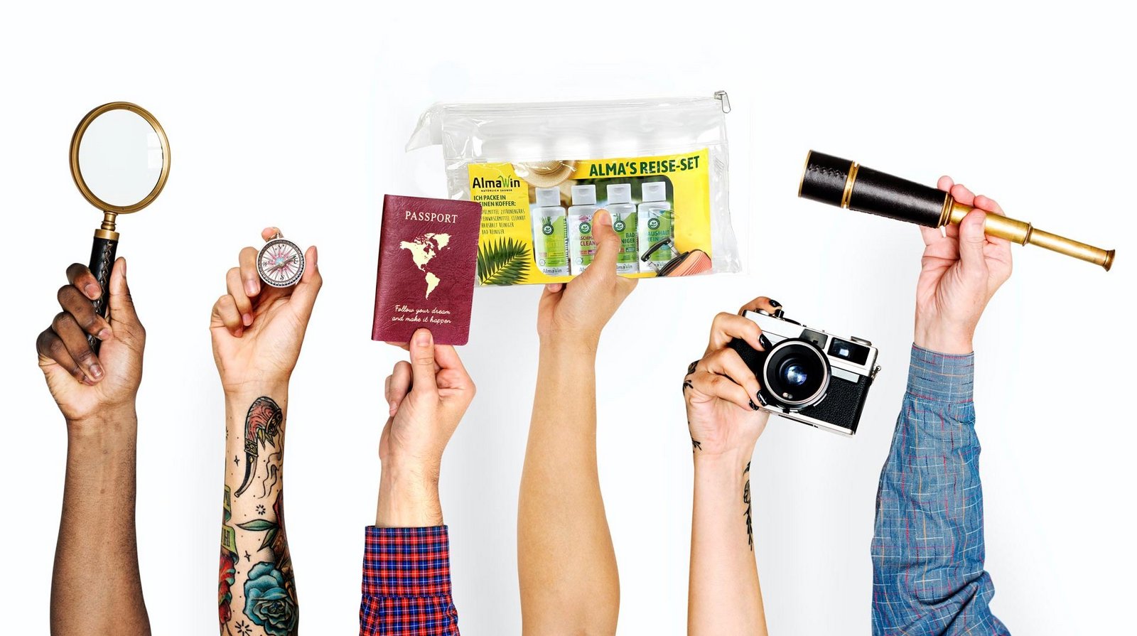 Hands holding up vacation utensils and the Alma's travel set